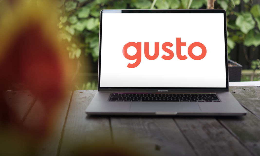 Gusto Payroll software image on a laptop